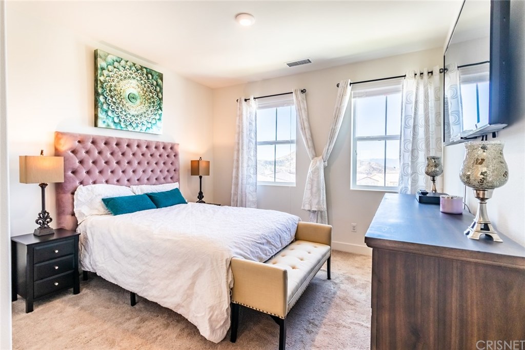 19047 Bension Drive Saugus, CA 91350 - Photo 43 of 72 bedroom 4. has mountain and sunset views and ensuite bathroom.
