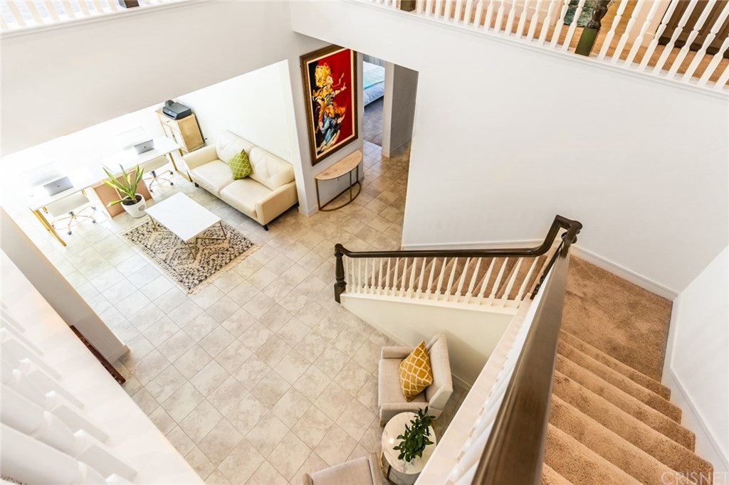 19047 Bension Drive Saugus, CA 91350 - Photo 58 of 72 View from top of the stairs into extended entry and office space.