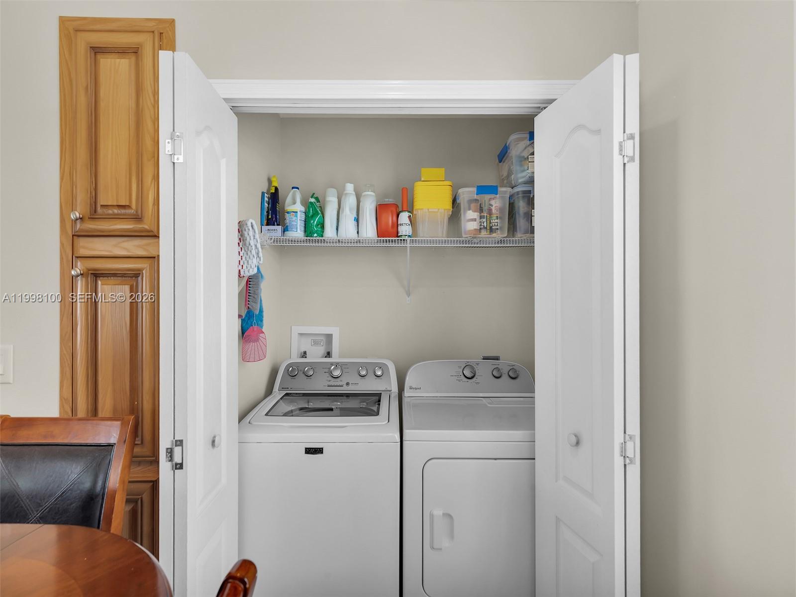 437 Pirates Road Summerland Key, FL 33042 - Photo 21 of 39 a utility room with closet dryer and washer