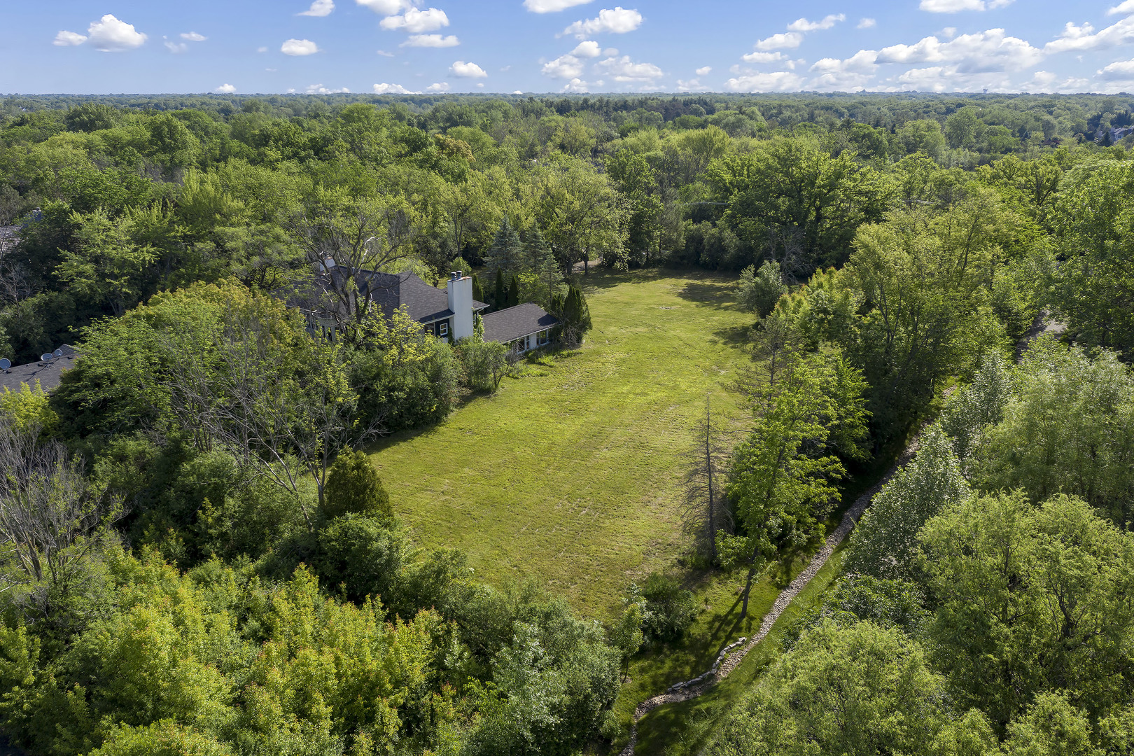 3000 Telegraph Road Bannockburn, IL 60015 - Photo 8 of 18 a view of a garden with a building in the background