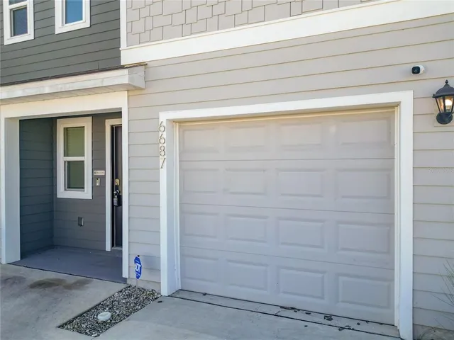 a front view of house with yard