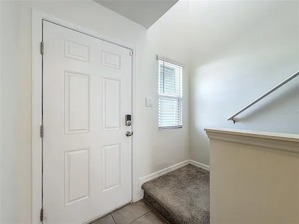 a bathroom with a mirror and a shower