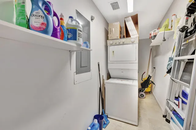 a bathroom with a toilet a sink and a mirror