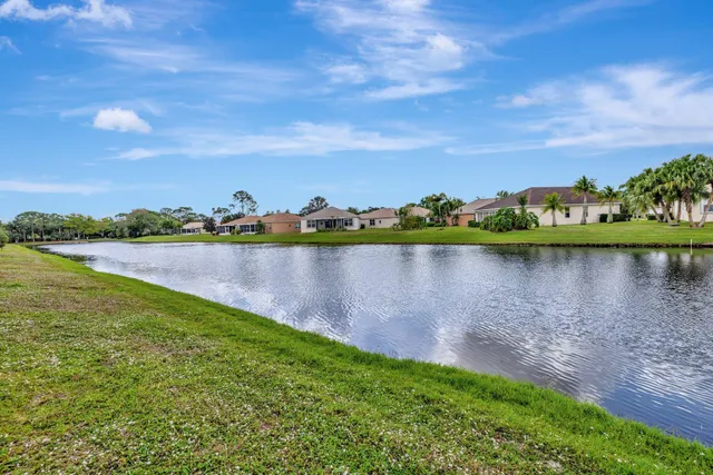 a aerial view of a house with a yard
