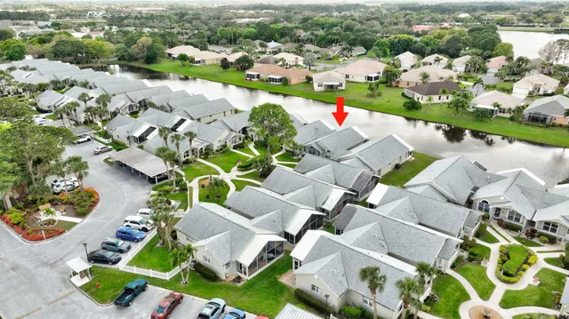 an aerial view of a house with a garden