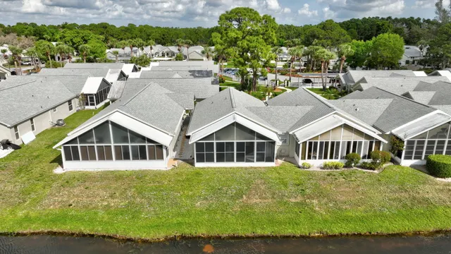 a house with trees in the background