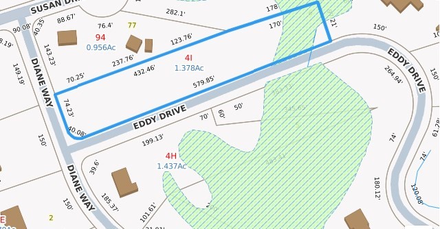 a close up of a wall with a potted plant