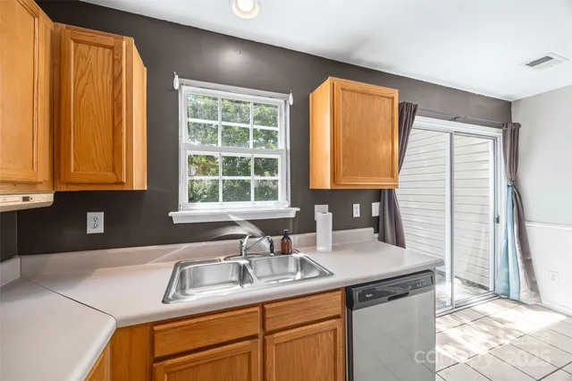 a utility room with washer and dryer