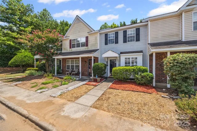 a view of a tree with a yard