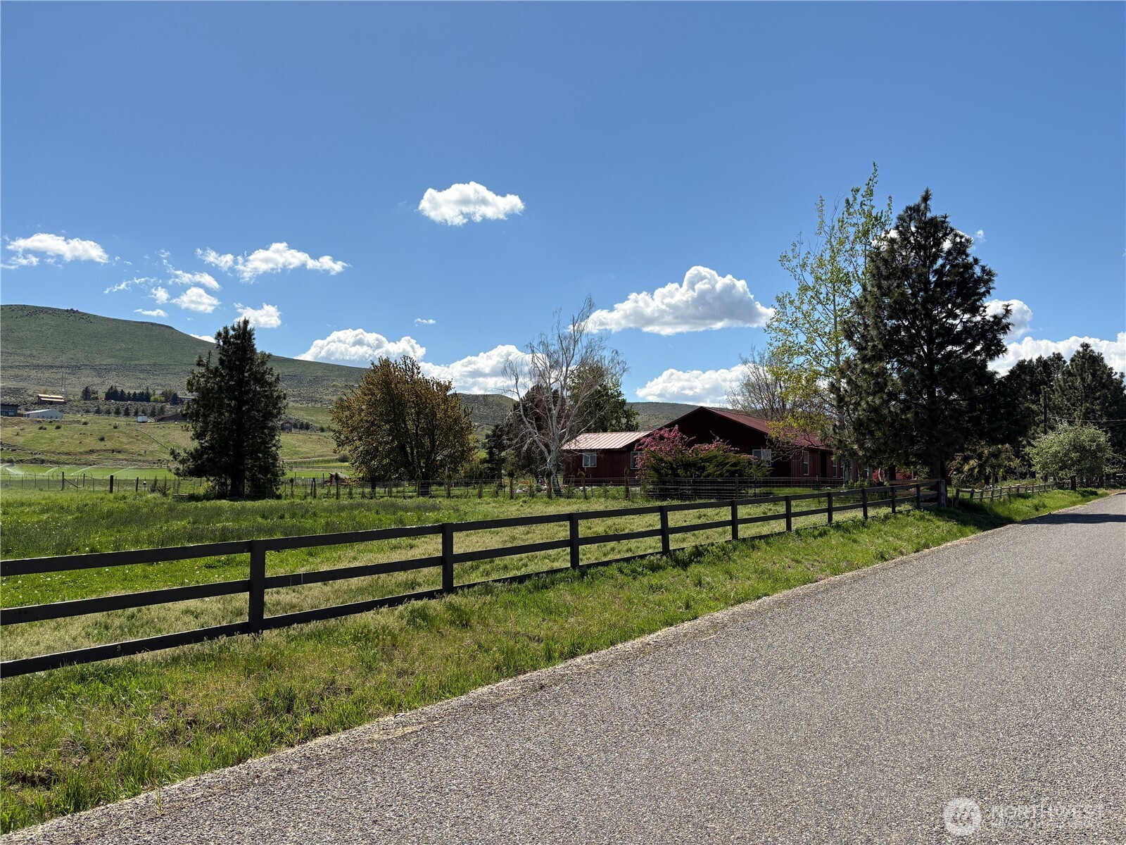 3620 Riverbottom Road Ellensburg, WA 98926 - Photo 1 of 1 a view of a road with a big yard
