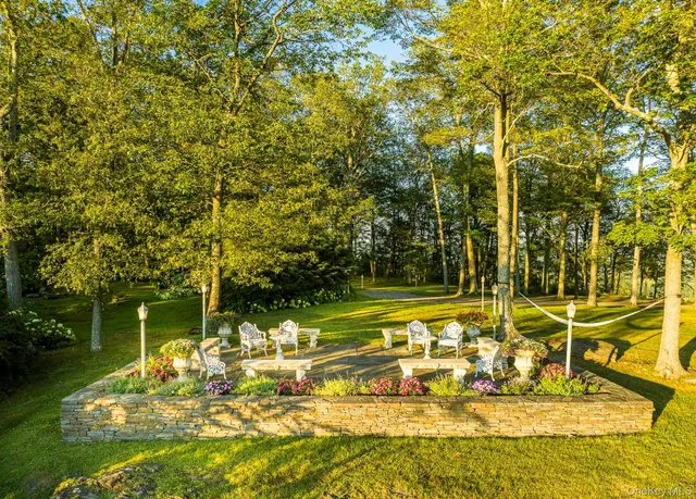 a view of a yard with an outdoor space