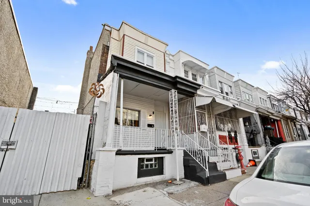 a street view with tall buildings