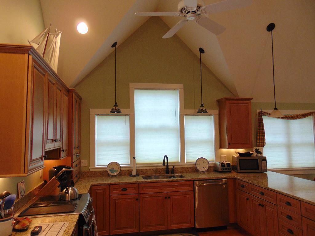 299 Wyman Road Milbridge, ME 04658 - Photo 12 of 31 Beautiful honeycomb blinds for all...