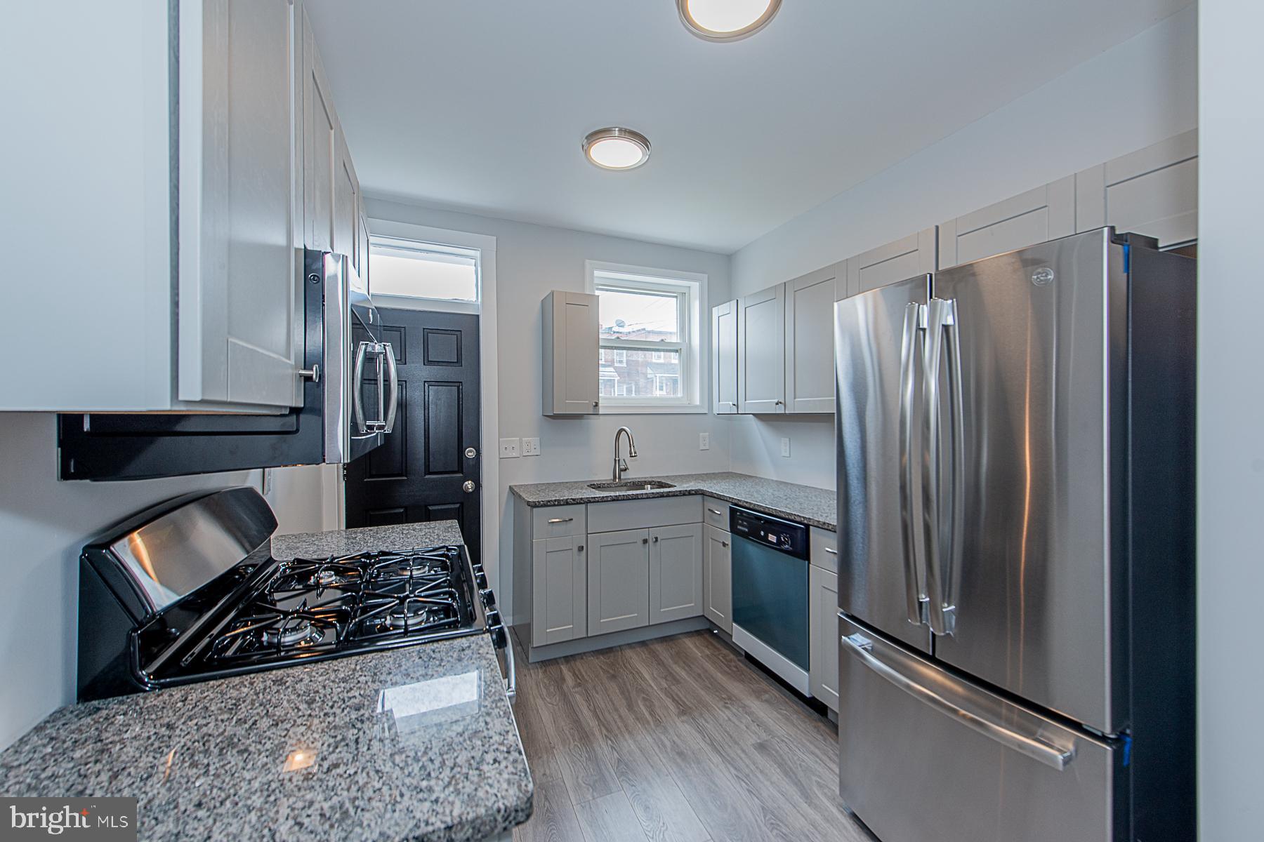 3915 Woodridge Road Baltimore, MD 21229 - Photo 6 of 14 Kitchen, new appliances, granite & cabinelts