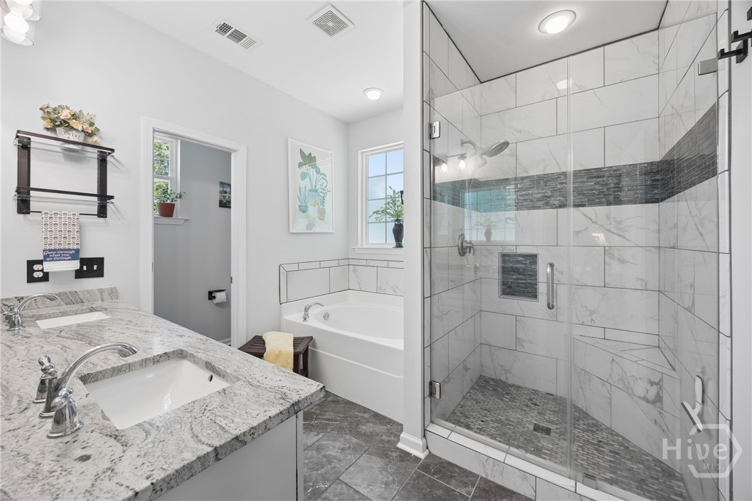103 Mingledorff Court Springfield, GA 31329 - Photo 20 of 33 Dual sinks, separate shower and bathrub