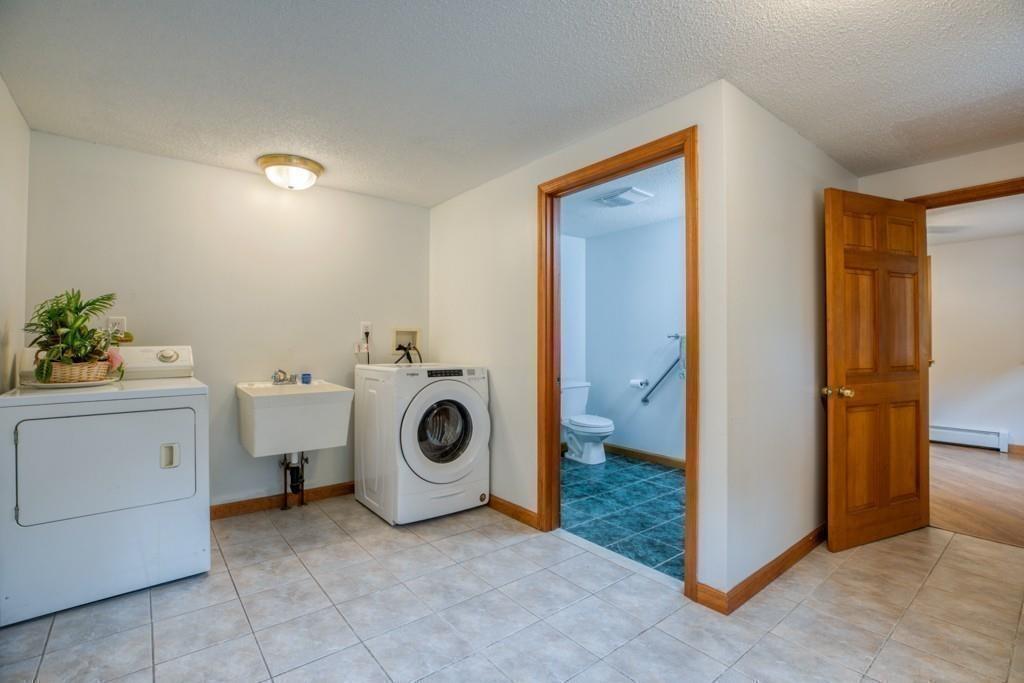 38 Berwick Road Longmeadow, MA 01106 - Photo 20 of 33 a utility room with dryer and washer