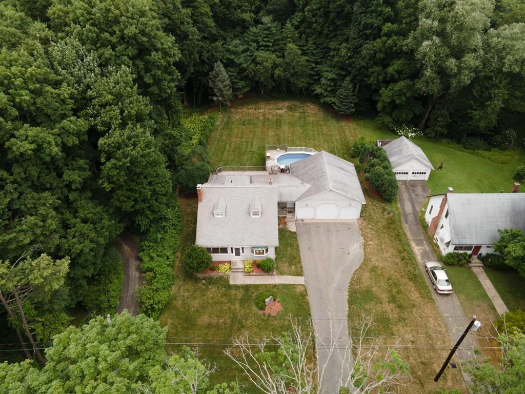 38 Berwick Road Longmeadow, MA 01106 - Photo 2 of 33 an aerial view of a house with outdoor space and trees all around