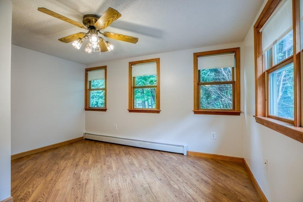 38 Berwick Road Longmeadow, MA 01106 - Photo 23 of 33 a view of an empty room with wooden floor and a window