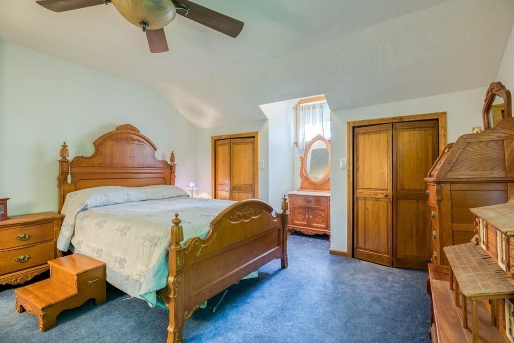 38 Berwick Road Longmeadow, MA 01106 - Photo 24 of 33 a bedroom with a bed and wooden floor