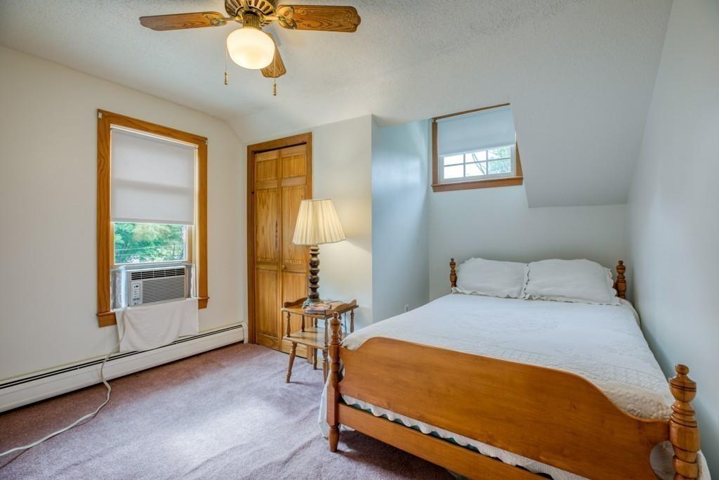 38 Berwick Road Longmeadow, MA 01106 - Photo 26 of 33 a bedroom with a bed and a window