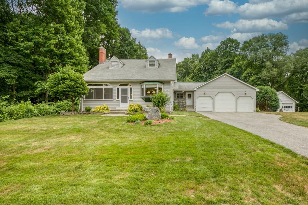 38 Berwick Road Longmeadow, MA 01106 - Photo 7 of 33 a front view of a house with yard and green space
