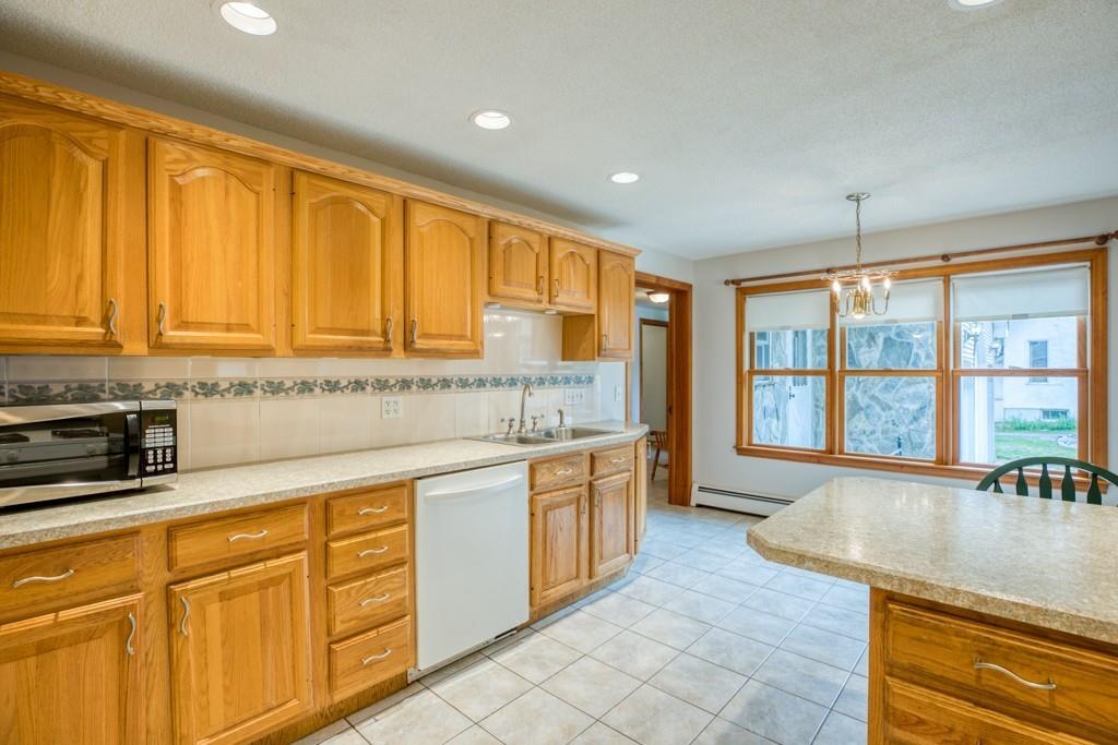 38 Berwick Road Longmeadow, MA 01106 - Photo 9 of 33 a large kitchen with stainless steel appliances granite countertop a sink and cabinets