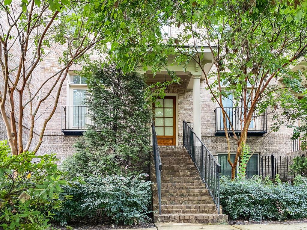 598 Ansley Circle Northeast Atlanta, GA 30324 - Photo 1 of 24 a view of house with backyard space and garden