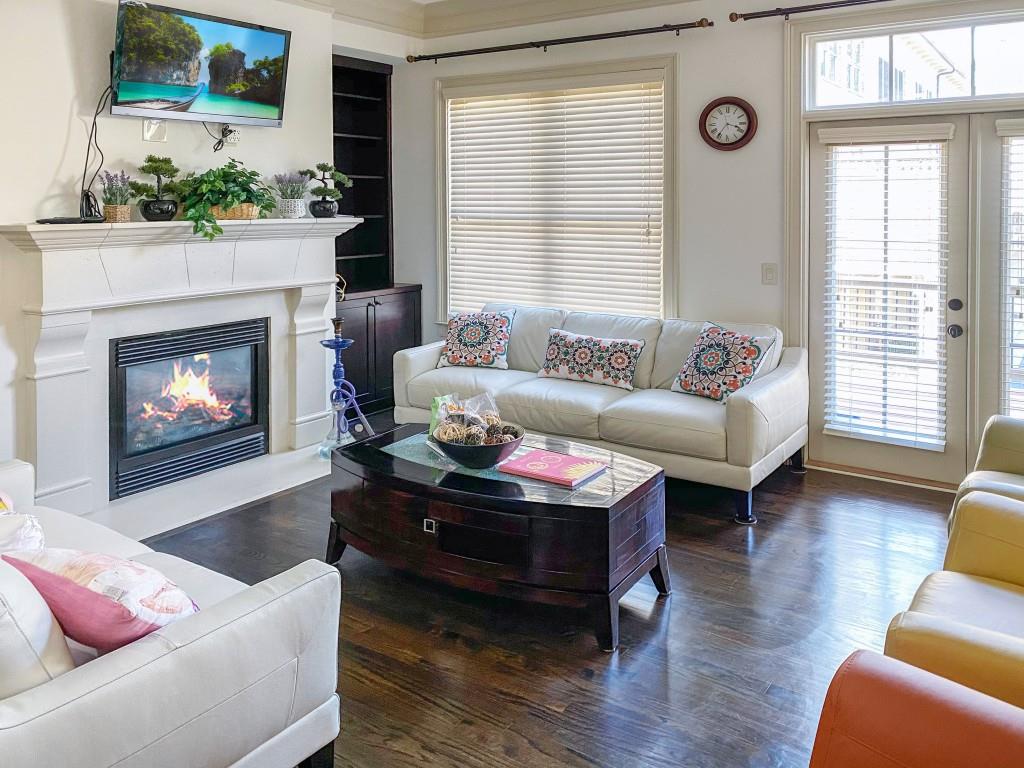 598 Ansley Circle Northeast Atlanta, GA 30324 - Photo 2 of 24 a living room with furniture and a fireplace