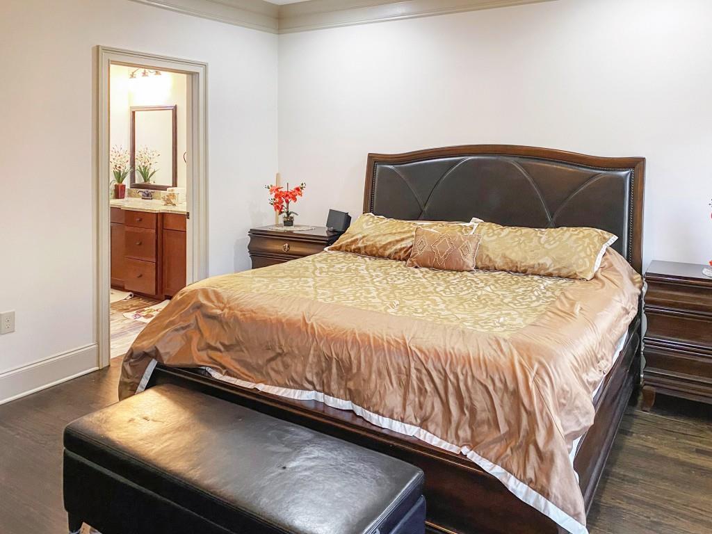 598 Ansley Circle Northeast Atlanta, GA 30324 - Photo 9 of 24 a bedroom with a bed and a window