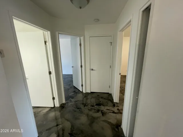 a view of bathroom with a sink and a mirror