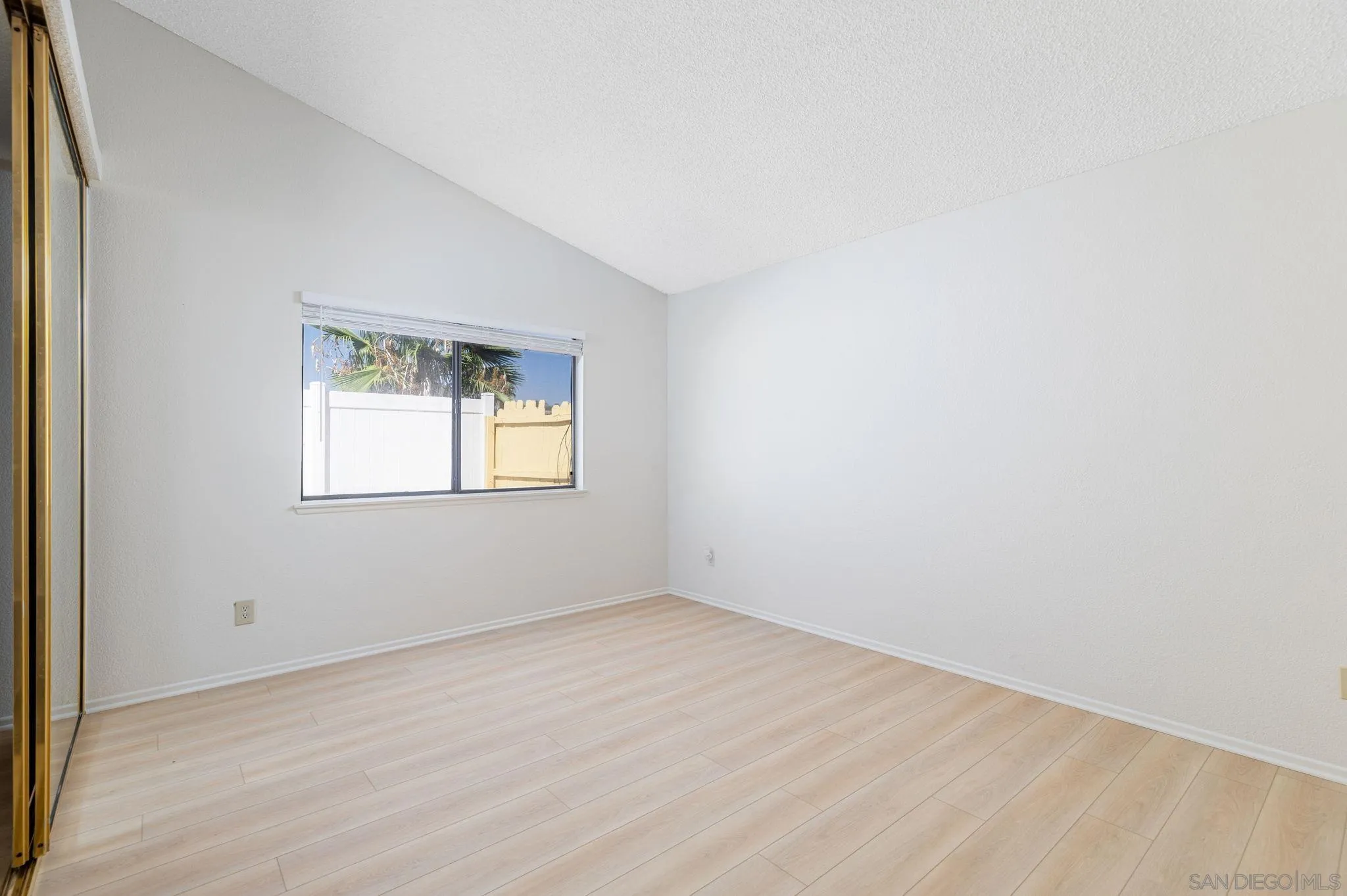 27971 Red Dawn Drive Menifee, CA 92585 - Photo 17 of 42 an empty room with a window