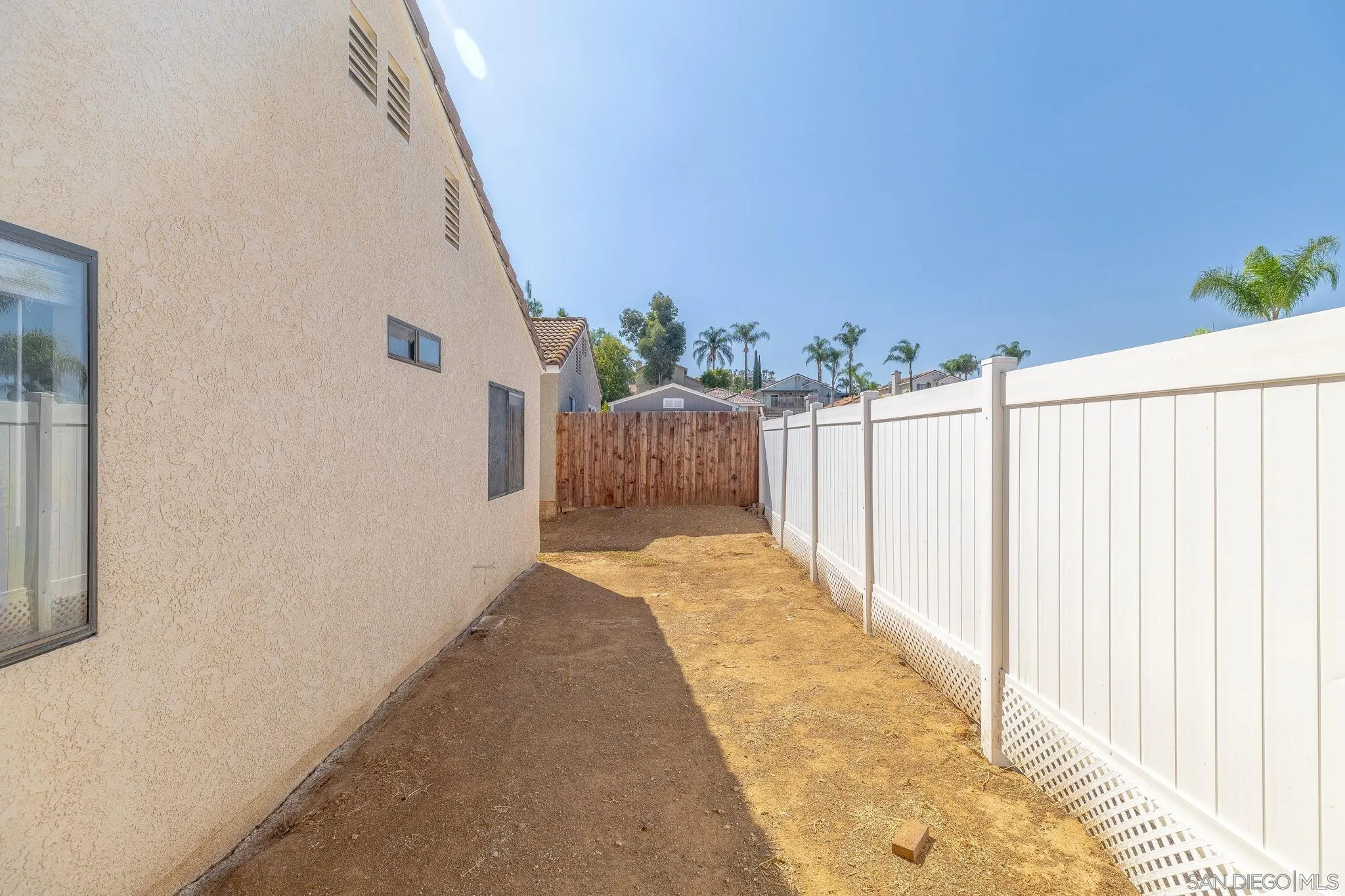 27971 Red Dawn Drive Menifee, CA 92585 - Photo 27 of 42 a view of a house with a backyard