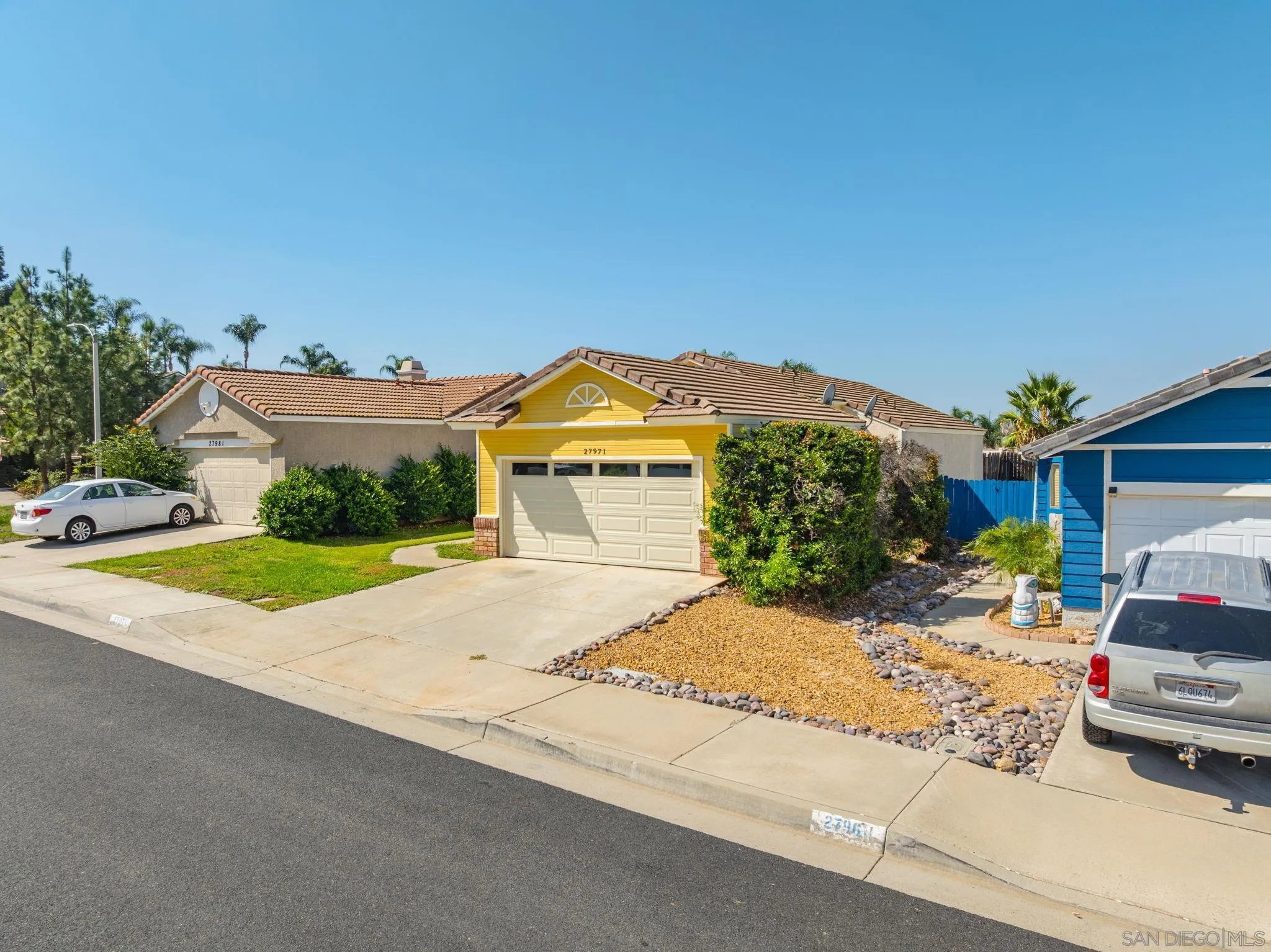 27971 Red Dawn Drive Menifee, CA 92585 - Photo 32 of 42 a view of front a house with a yard