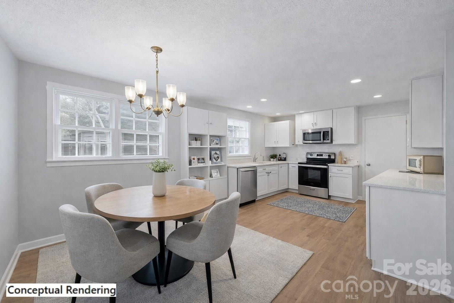 5 Cartwright Street York, SC 29745 - Photo 12 of 28 a kitchen with cabinets and wooden floor