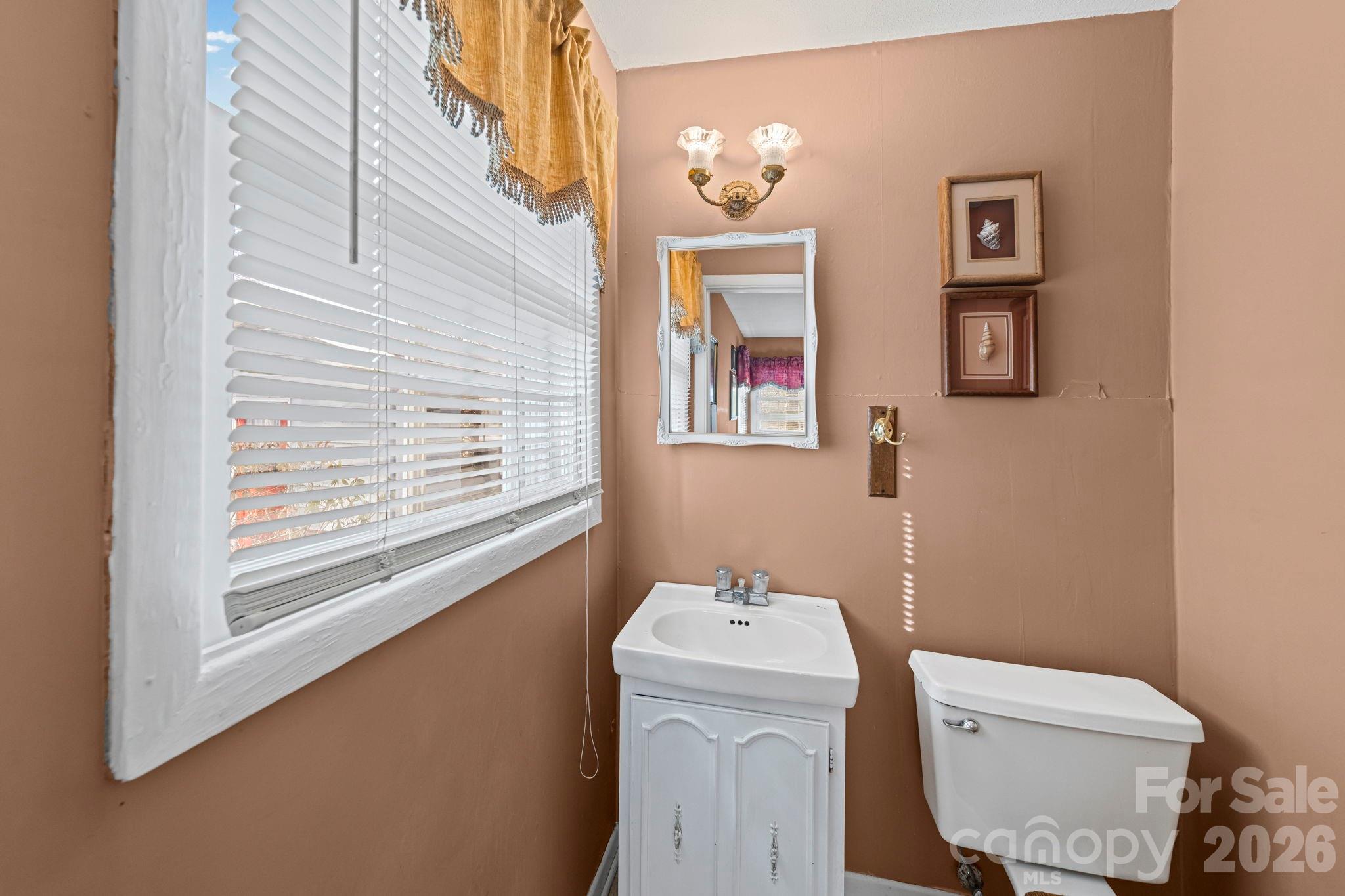 5 Cartwright Street York, SC 29745 - Photo 25 of 28 a bathroom with a sink and toilet