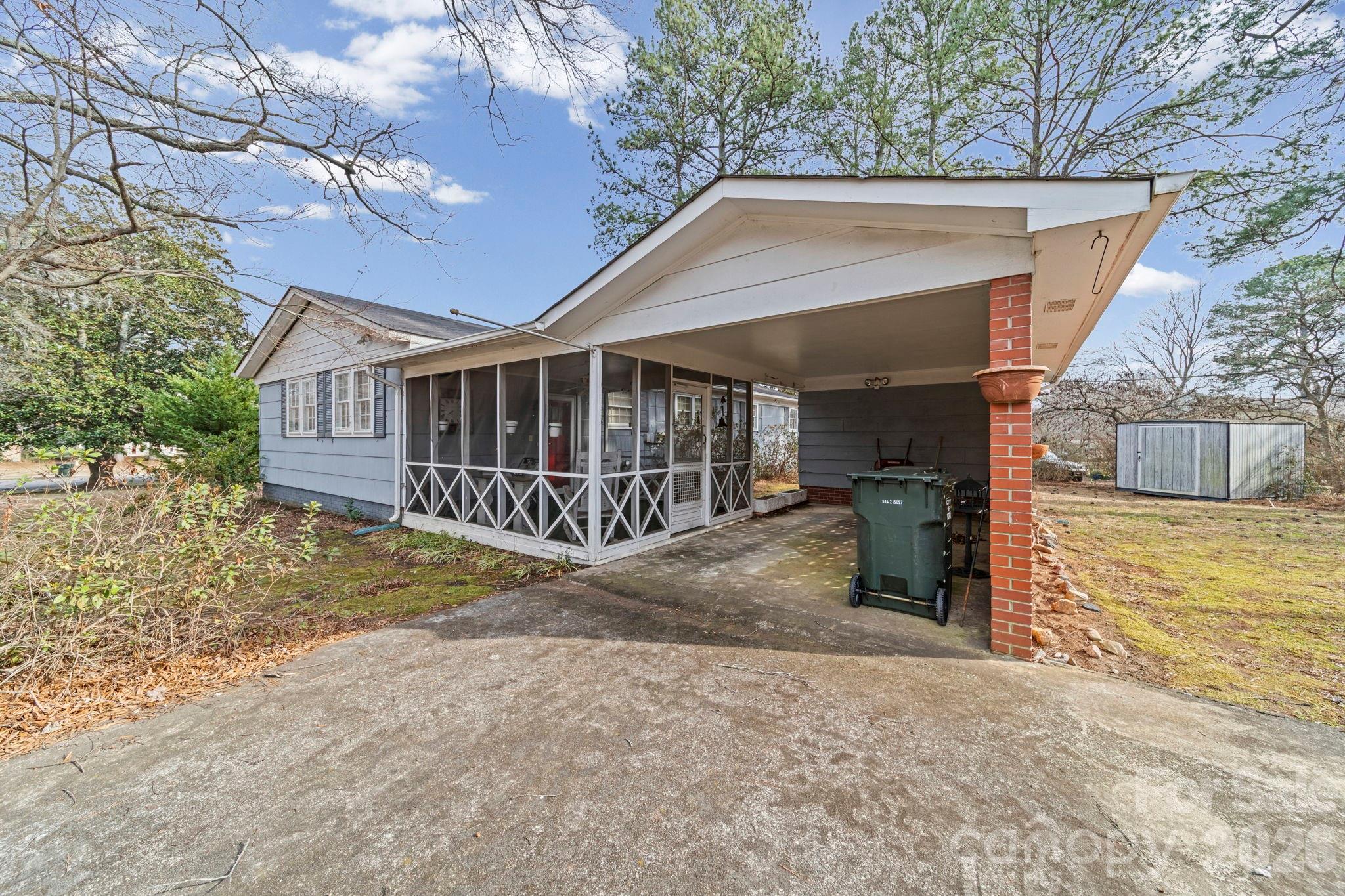 5 Cartwright Street York, SC 29745 - Photo 3 of 28 a view of house with a yard and large tree