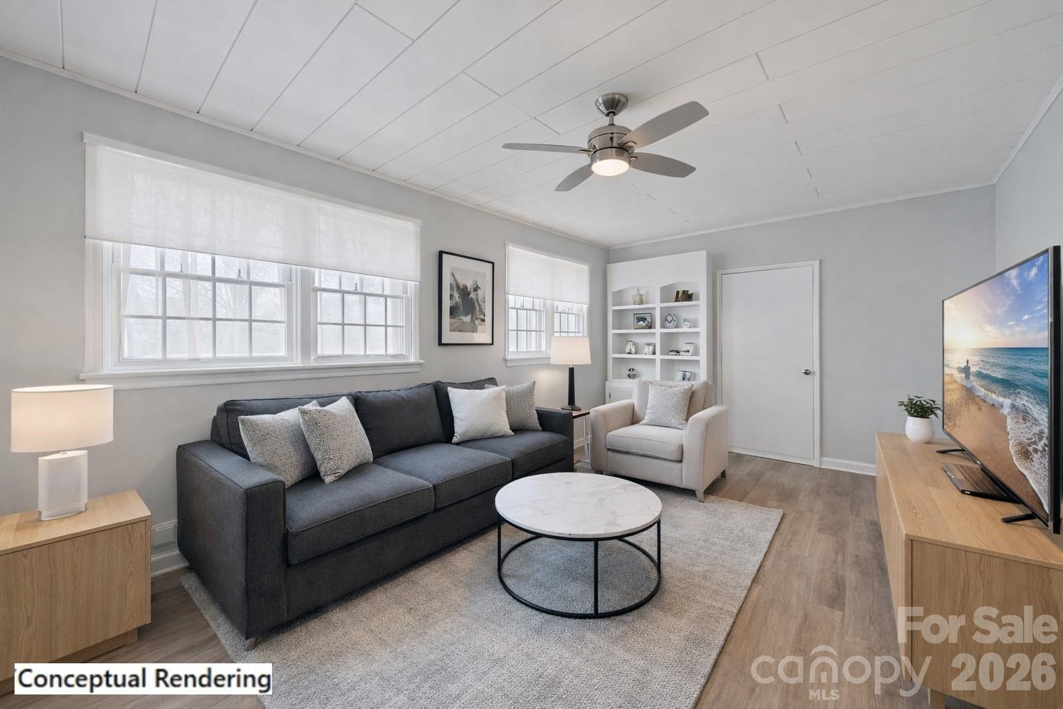 5 Cartwright Street York, SC 29745 - Photo 9 of 28 a living room with furniture a rug a window and a flat screen tv