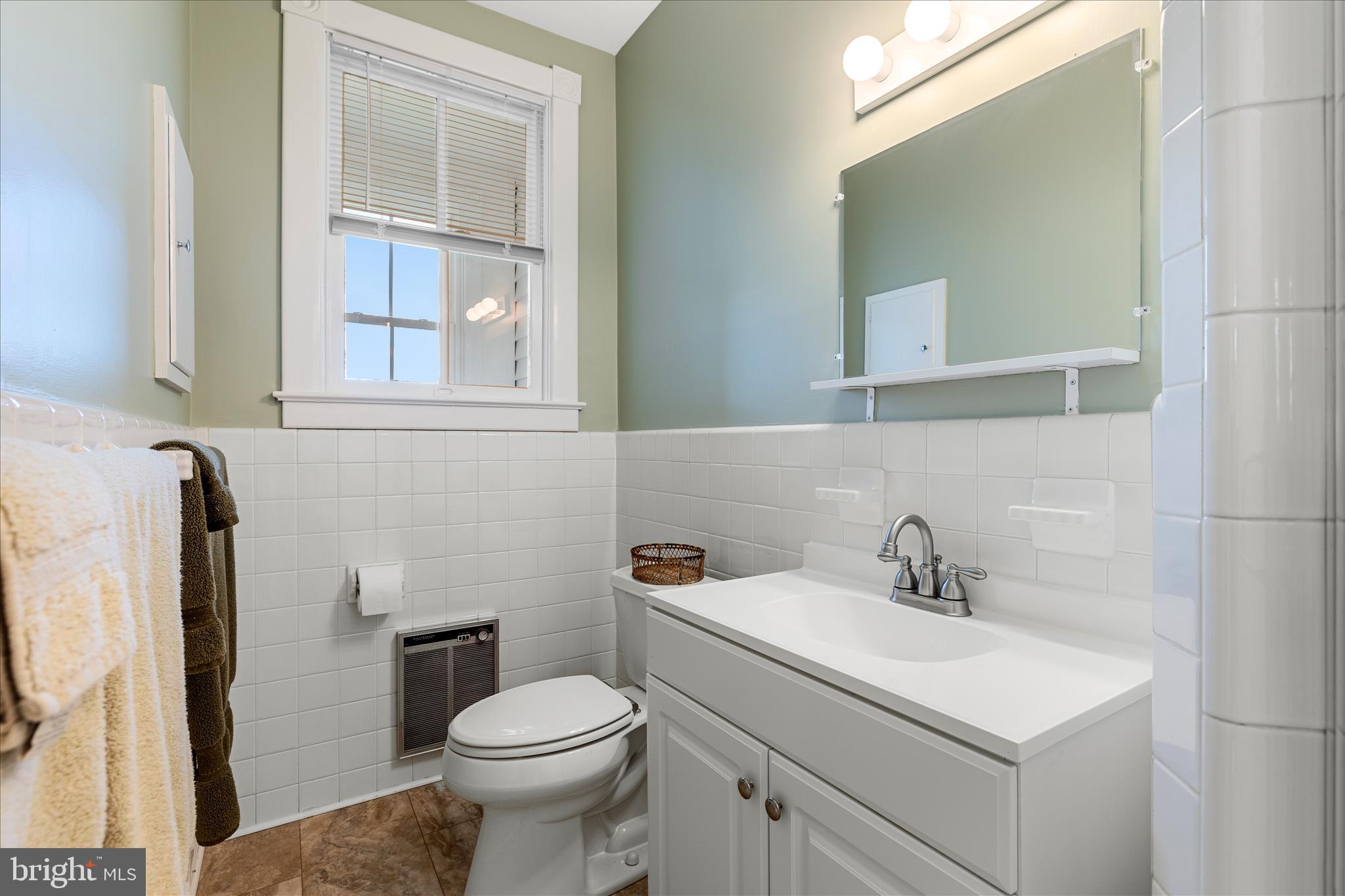 5452 Middle Road Winchester, VA 22602 - Photo 19 of 52 a bathroom with a sink toilet and a mirror