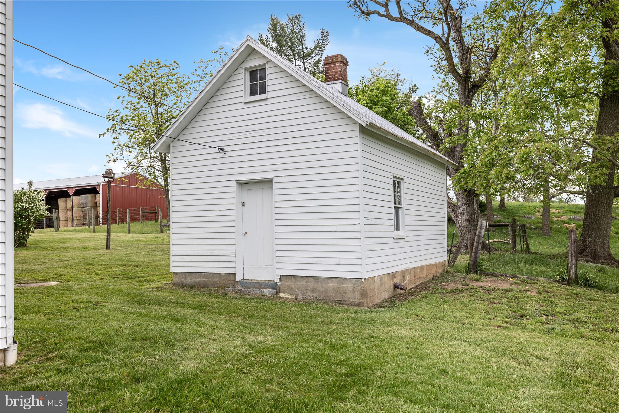 5452 Middle Road Winchester, VA 22602 - Photo 41 of 52 a view of a house with a yard