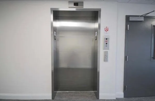 a kitchen with a refrigerator a stove and oven