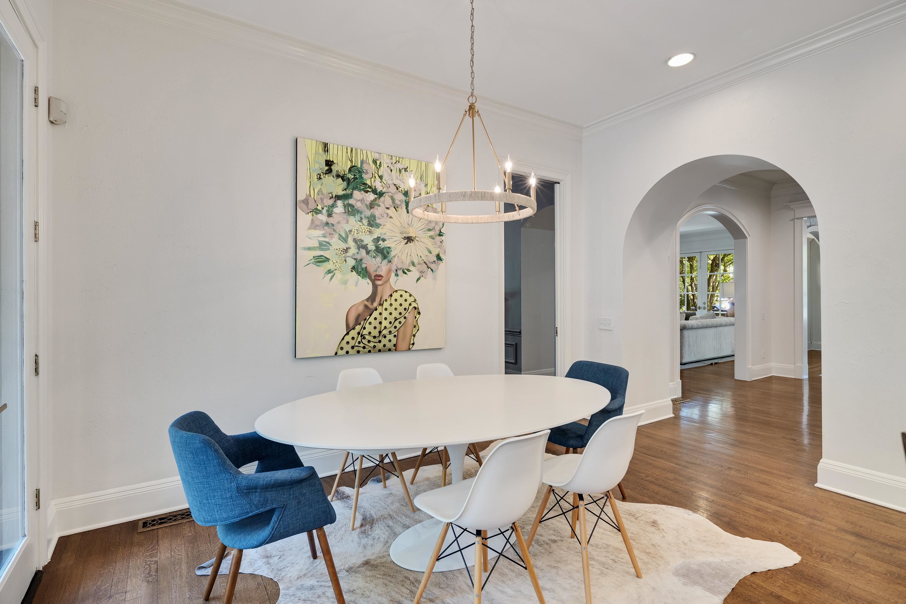 165 Waring Road Memphis, TN 38117 - Photo 17 of 40 Dining area featuring arched walkways, a chandelier, wood finished floors, and ornamental molding
