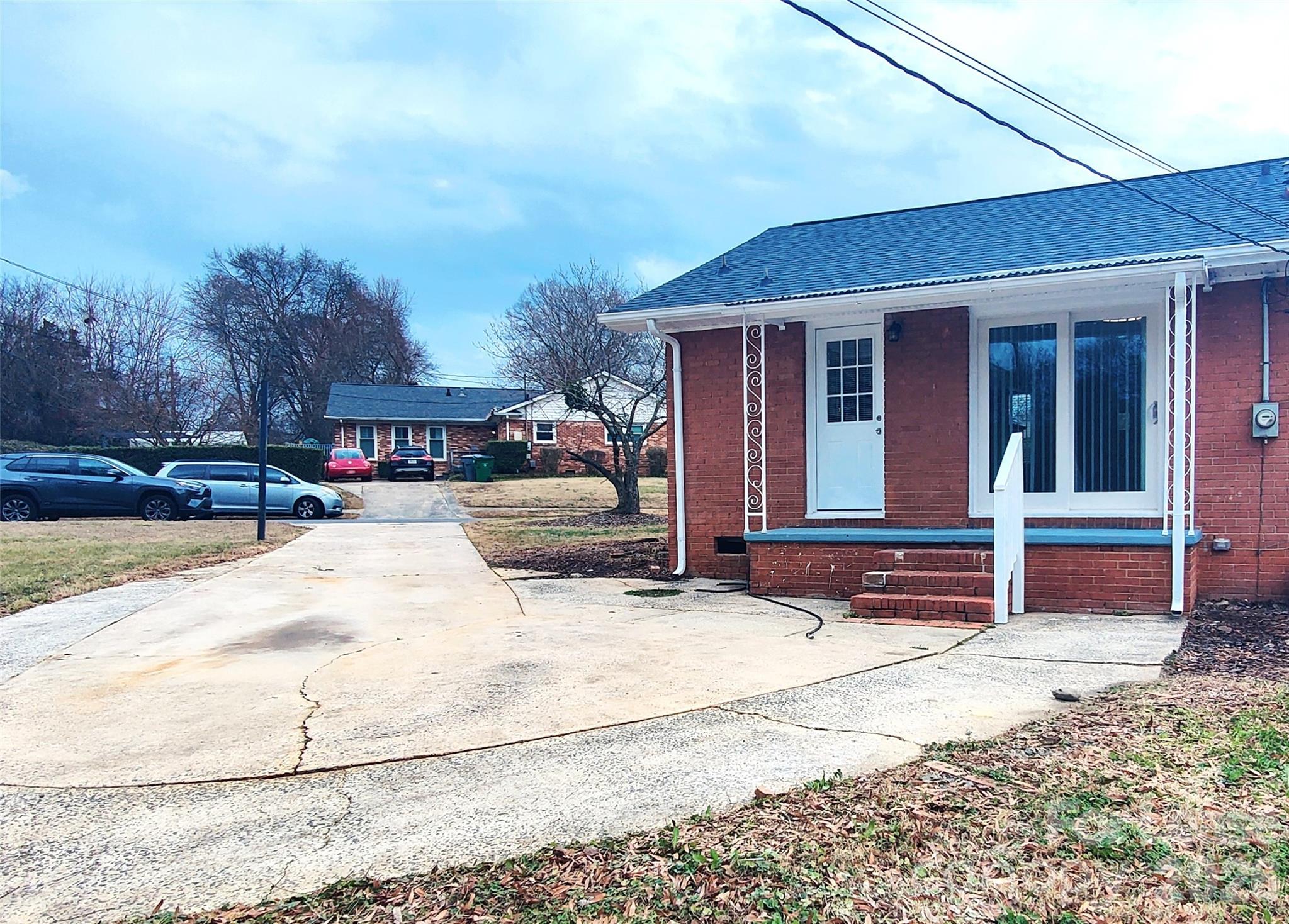 4100 Broadview Drive Charlotte, NC 28217 - Photo 22 of 24 a view of house with outdoor space and sitting area