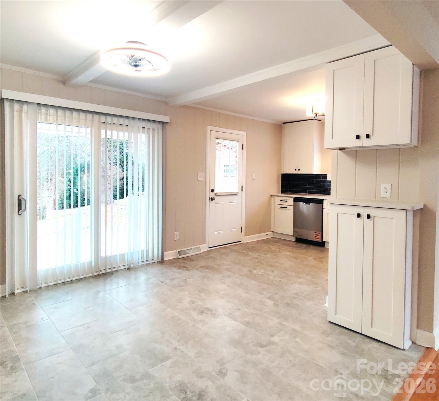 4100 Broadview Drive Charlotte, NC 28217 - Photo 6 of 24 a view of kitchen with wooden cabinets and refrigerator