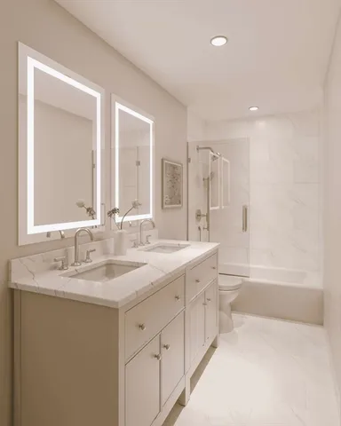 a bathroom with a double vanity sink mirror double and bathtub
