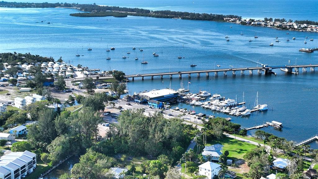 4210 128th Street West Cortez, FL 34215 - Photo 1 of 5 a view of a lake with a city view