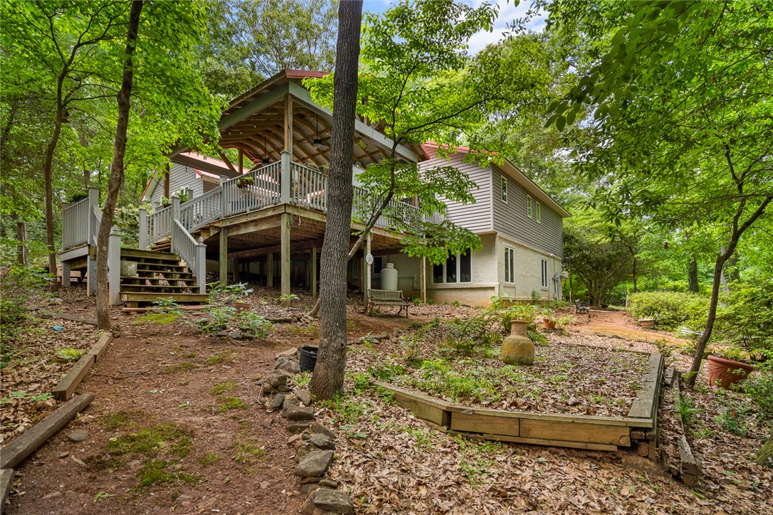 324 Hobson Road Anderson, SC 29621 - Photo 37 of 46 This secluded residence features a multi-level deck, perfect for enjoying the serene wooded surroundings.