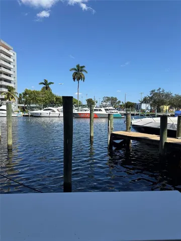 a view of a balcony with chairs