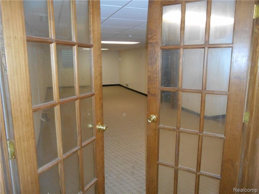 25754 Peter Kaltz Road Warren, MI 48091 - Photo 41 of 68 ADDITIONAL VIEW OF PANELED DOORS LEADING TO BASEMENT