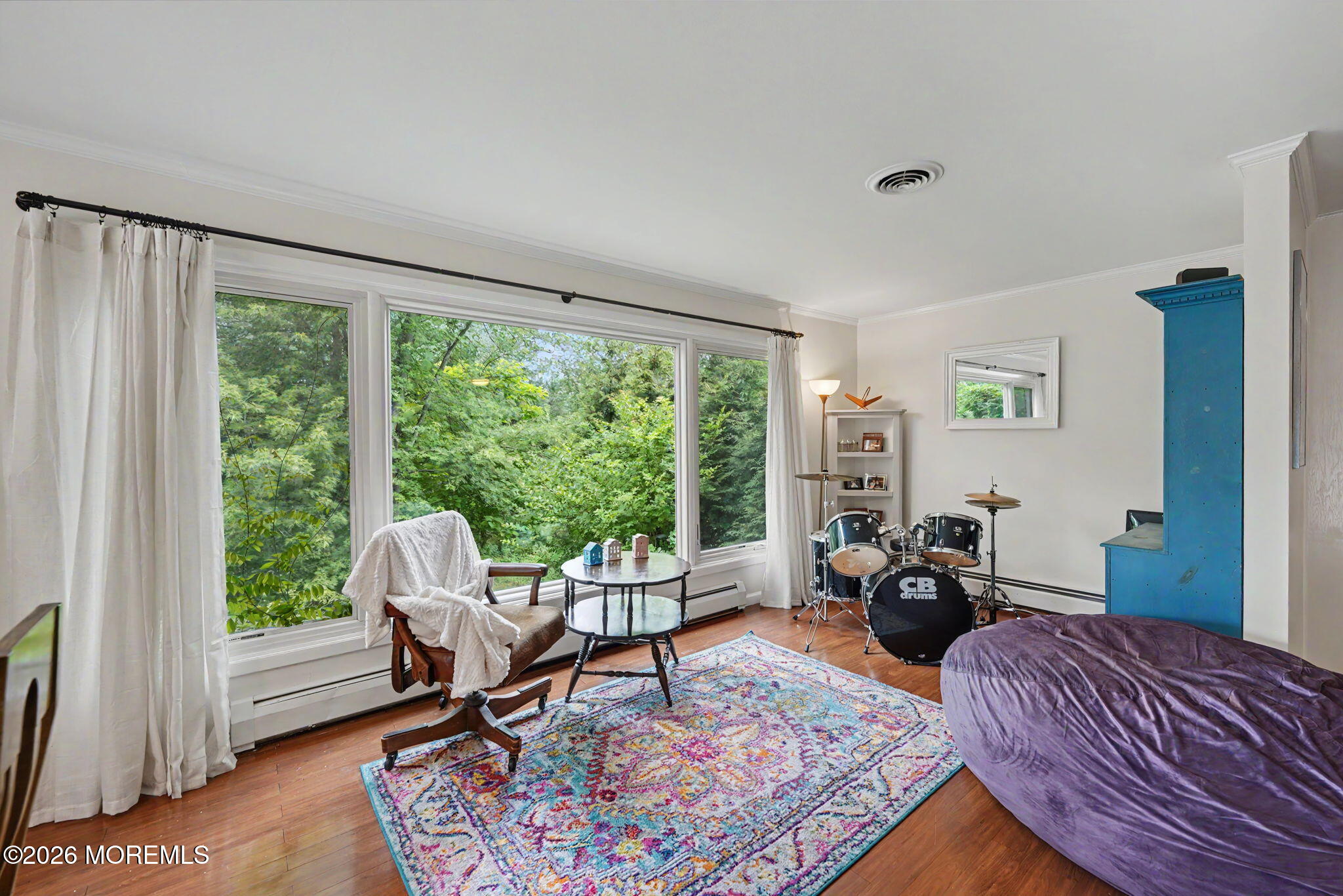 699 Aldrich Road Howell, NJ 07731 - Photo 11 of 30 a living room with furniture and a large window