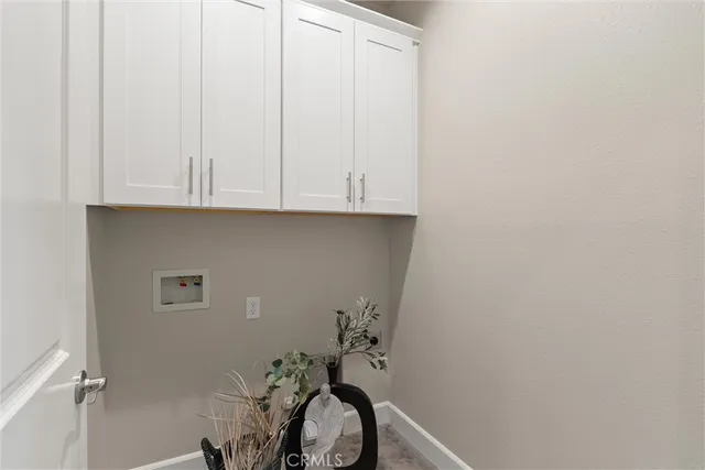 a view of bathroom with marble wall